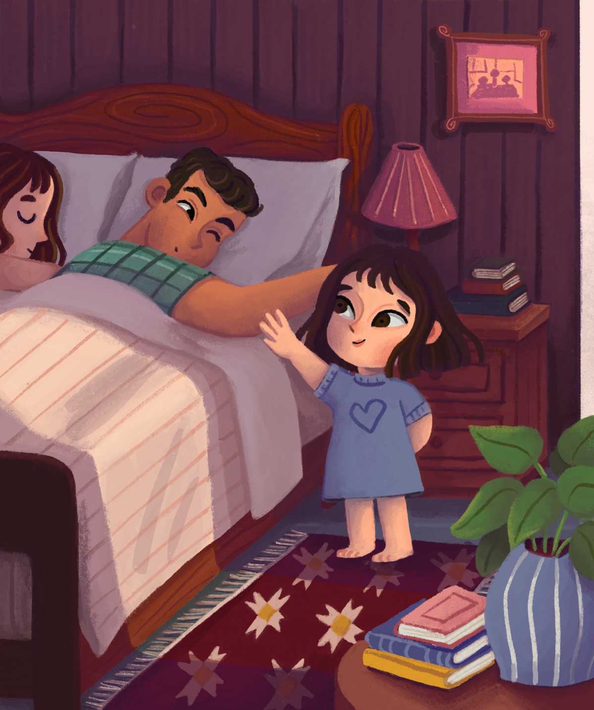 An illustration inside a bedroom, where a small child in a blue dress stands beside a bed, reaching out to an adult partially visible under the covers. Another adult's head is on the pillow next to them. A nightstand with a lamp and books is on the right.